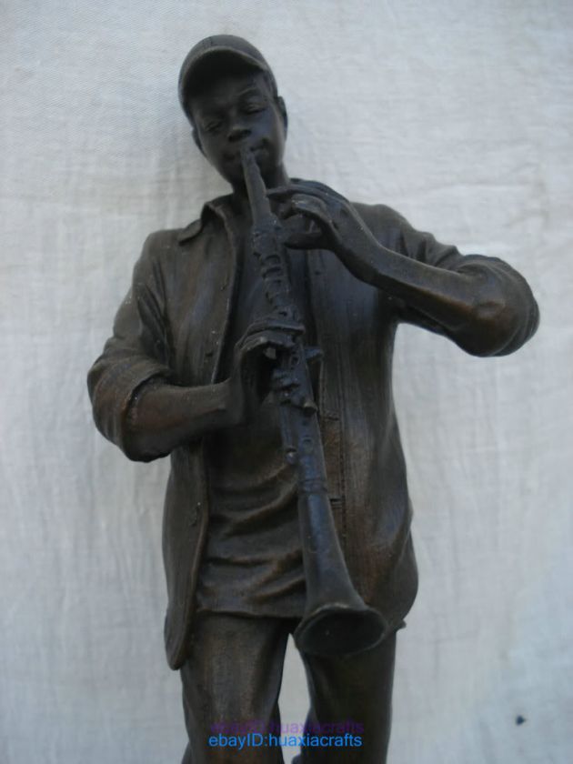 Bronze statue sculpture wind instrument African boy  