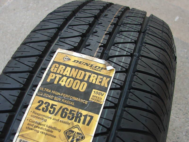 Four Brand New 235 65 17 Dunlop Grandtrek PT 4000 Tires 108V *SHIPPING 