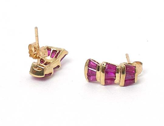 solid 14k yellow gold 75 pts. tapered baguette cut rubies 9/16 tall x 