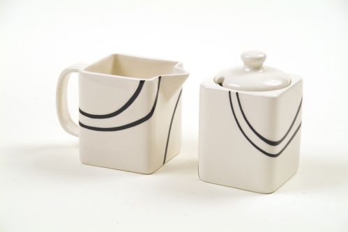   days this unique stoneware sugar and creamer set will serve you well