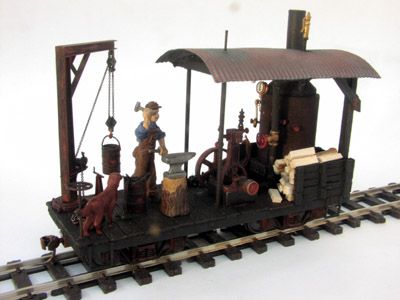 On30/148 BLACKSMITHS WORKSHOP KIT on 18 FLATCAR  