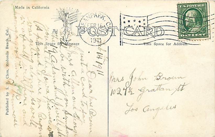 IMPRINT FROM POSTAL CANCEL AND SOME POSTAL INK ON FRONT OF CARD