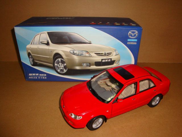 18 Mazda Family 323 red color  